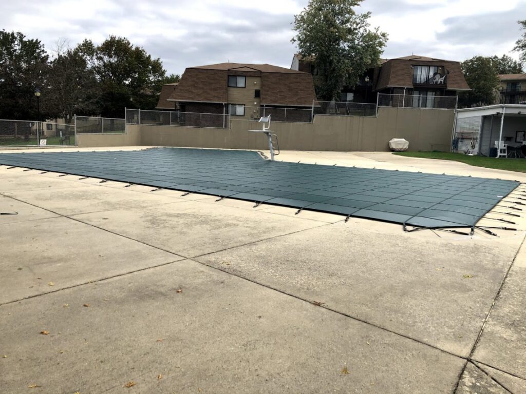 A covered pool in a neighborhood.