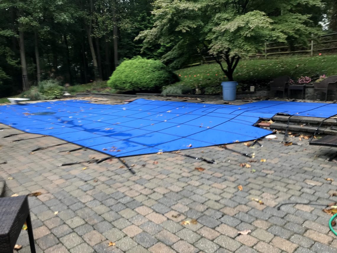 pool cover protecting it from leaves