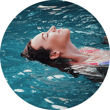 woman relaxing in pool