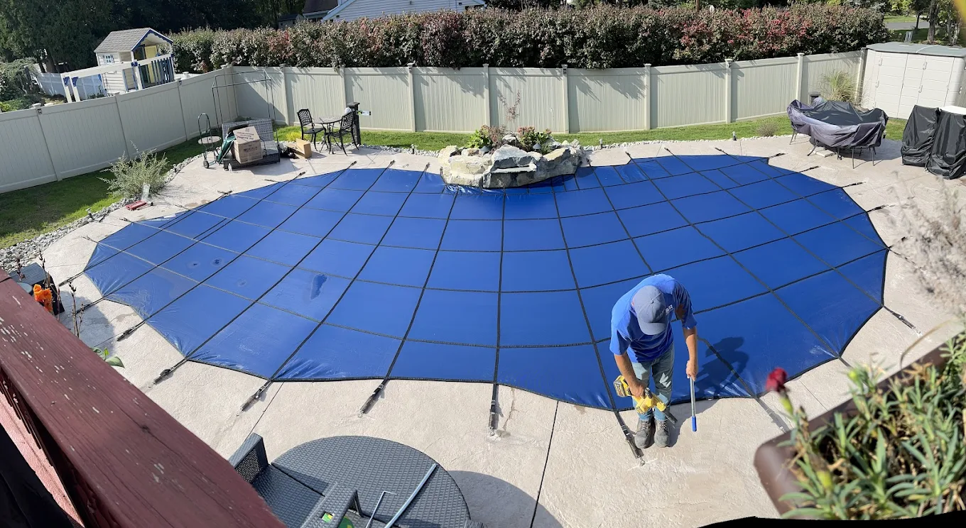 pool safety cover installation over inground pool