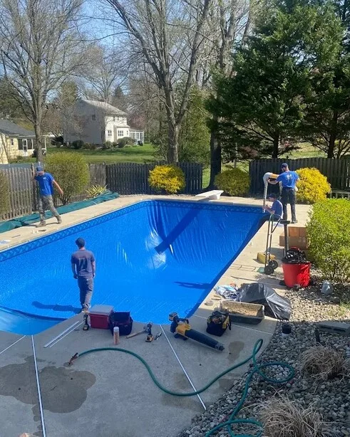 pool service team working on installation